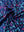 Close-up of navy colorful flower performance print boys golf polo fabric showing moisture-wicking texture and vibrant pattern.