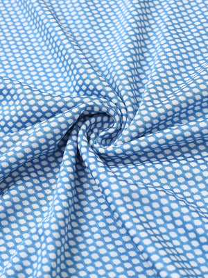 Close-up of blue white your favorite jacquard polo fabric showing textured knit and soft finish.