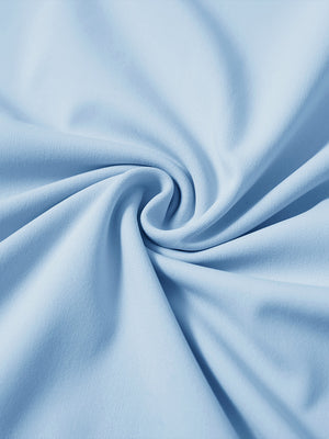 Fabric detail of youth long sleeve hoodied with kangaroo pocket, soft knit texture with light blue tone