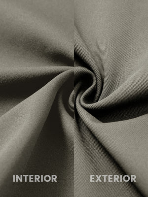 Close-up of fabric on water-resistant zip up golf jacket, showing texture and finish in dark khaki.