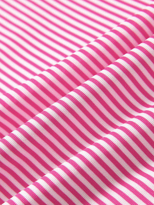 Texture close-up of Kids stripe golf polos with soft fabric and bright rose stripe stripes