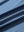 Fabric detail of Classic stripe polo shirts with crisp lines and smooth blue denim stripe finish