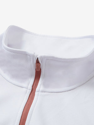Collar detail close-up in white lightweight sleeveless quarter zip golf vest