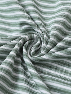 Close-up of dark green stripe sport fit stripe polo fabric showing crisp horizontal stripes and smooth, breathable texture.
