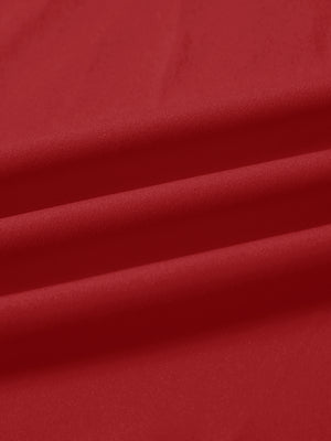 Close-up fabric detail of lightweight golf quarter zip pullover, smooth texture and breathable feel in red