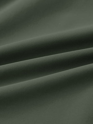 Fabric detail of Performance tapered sports joggers with smooth stretch feel in olive green