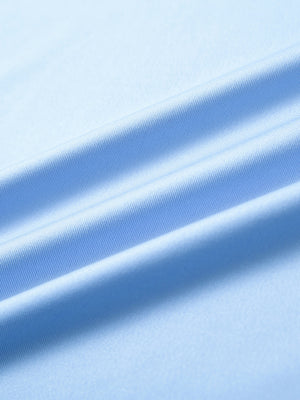 Close-up of light blue everyday classic solid polo fabric texture.