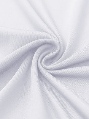 Close-up of white women's performance solid polo fabric texture.