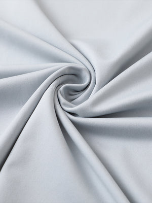 Close-up of navyglacier grey premium performance polo fabric showing smooth texture.