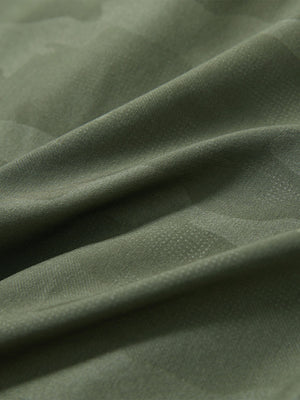 Close-up fabric texture detail of military green water-resistant short sleeve q-zip hoodie for boys
