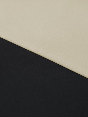 Fabric detail of Fleece lined golf quarter zip showing warm texture in black/grey