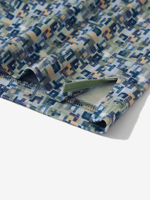 Detail: hem slit of blue abstract stretch printed collarless henley golf shirts