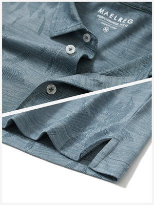 Detail shot of collar and hem of blue flower breathable jacquard pattern 3-button golf polo