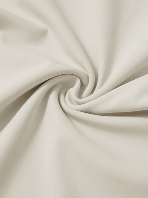 Close-up of fabric on soft lightweight casual golf pants with 5 pockets, showing texture in cream.