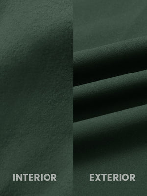 Close-up of inside and outside fabric of water-resistant fleece golf vest in forest green, highlighting material texture and durability for optimal performance.