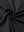Close-up of black elegant performance jacquard polo fabric showing refined texture and subtle pattern.