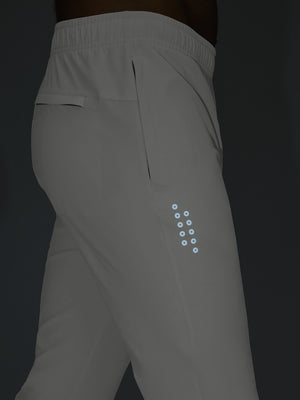 White superion softness mesh joggers with zipper pockets glowing in the dark