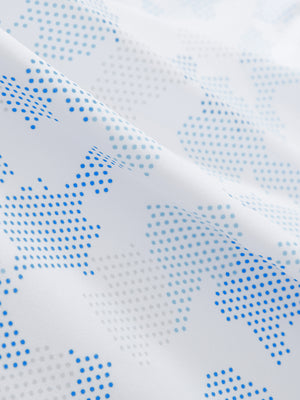 Close-up of sky blue camo stretch printed collarless henley golf shirts, showcasing texture and print details.