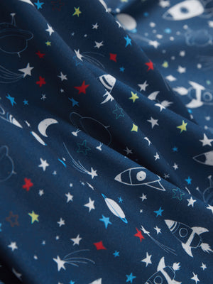 Close-up of space rocket performance print boys golf polo, showcasing texture and print details.