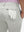Detail view of back pocket on silver gray breathable casual slacks with 4 pockets