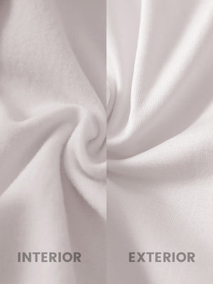 Close-up of fleece-lined fabric on women's lightweight puffer jacket, showing texture in oyster gray.