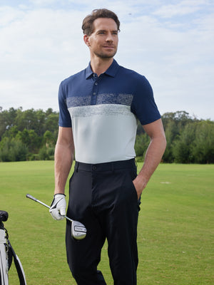 Model in navyglacier grey premium performance polo holding a golf club outdoors, half-body shot
