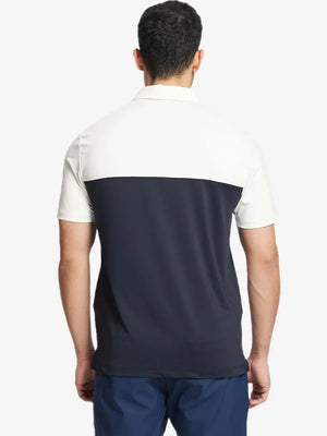 Back half-body view wearing DARK GREY Premium Performance Polo