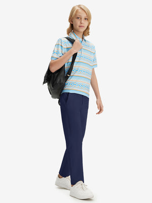 Full-body front view of model wearing the dark blue youth water resistant cotton blend golf pants for a complete look
